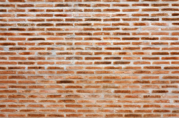 old orange brick wall background for architecture and building retro or vintage pattern style