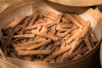 Cinnamon in circle wooden trey