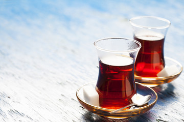 Travel concept: tea in traditional Turkish cups