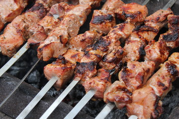 Meat porkis fried on the grill skewers at coals 20464