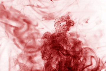 Toxic fumes movement on a white background..Red smoke movement on a white background.