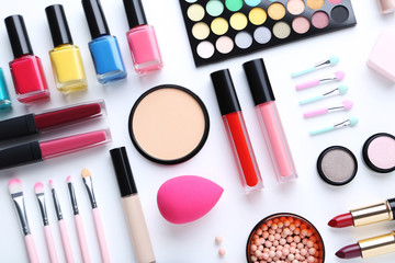 Obraz na płótnie Canvas Different makeup cosmetics on a white background