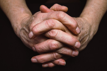 Fototapeta premium Old hands clasped together