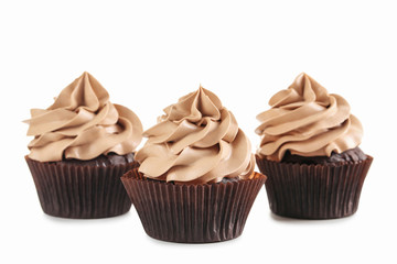 Tasty cupcakes isolated on a white