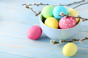 Easter eggs on a blue wooden table