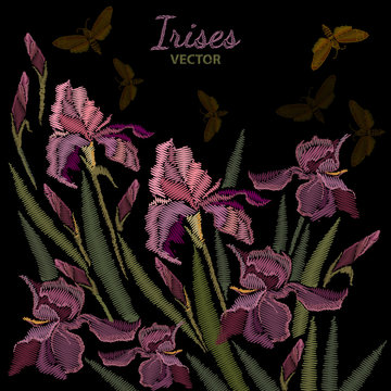Embroidery irises. Beautiful spring purple irises against black background