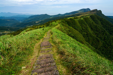 Fototapeta na wymiar Part of the Caoling Historic Trail tracing a mountain ridge on the east coast of Taiwan