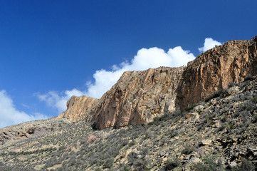 Rocky mountains, blue sky and white clouds