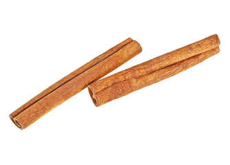 Cinnamon sticks on white background, top view
