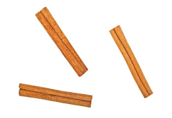 Cinnamon sticks on white background, top view