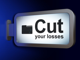 Business concept: Cut Your losses and Folder on billboard background