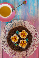 Cake on color background