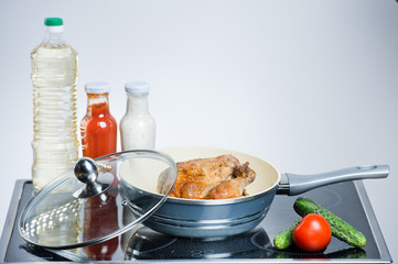 chicken cooked in a frying pan