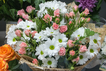 Bunch of large white chrysanthemums and pink roses