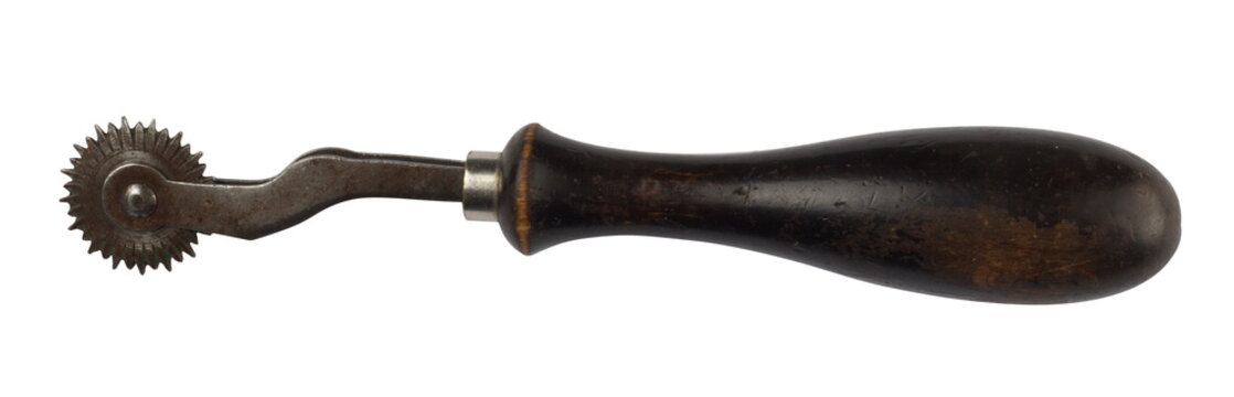 Vintage old pattern tracing tailor tool