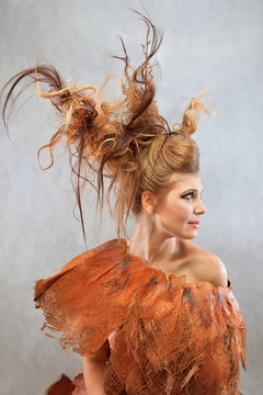 Woman in a orange outfit, portrait, fashion, studio