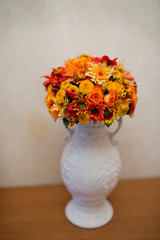  live flowers in vases baskets on a table decoration