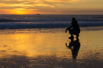 Obraz premium Watching the sunset