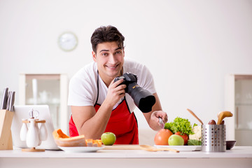 Fototapeta na wymiar Food blogger working in the kitchen