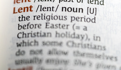 Close up of English dictionary page with definition of the word Lent