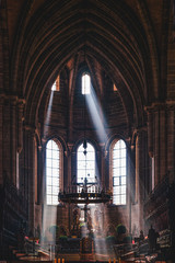 Beams of light pour in through chapel windows