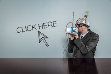Click here text with vintage businessman