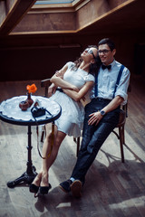 Fototapeta na wymiar Romantic couple in love bonding in cafe