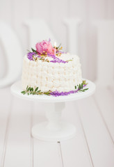 cake with flowers and candle