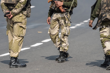 Security men with assault rifle