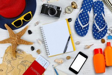 Travel accessories on color background