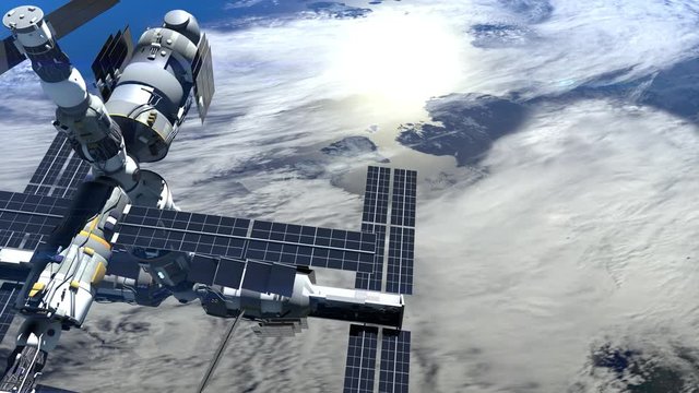 Space Station Above The Earth. The static camera. International space station is orbiting the Earth. ISS. 4K.