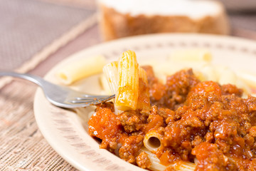 Pork and beef minced meat with tomato sauce and macaroni