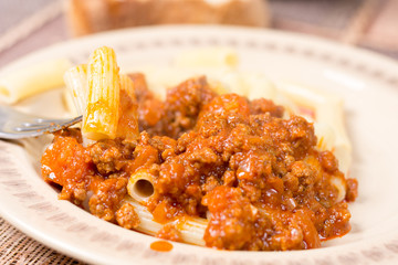 Pork and beef minced meat with tomato sauce and macaroni