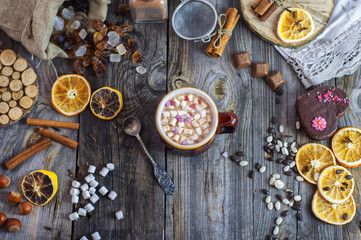 Fototapeta na wymiar Cocoa with marshmallows and an iron spoon