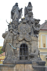 Fototapeta na wymiar Prague, Czech Republic - October 8, 2015 : Statue decoration of Charles Bridge in Vltava river. Unfiltered. Famous tourist and traveler routs