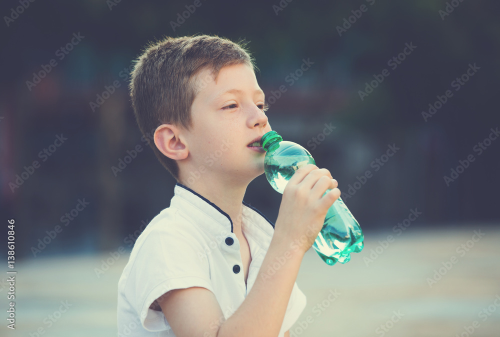 Wall mural boy with water bottle