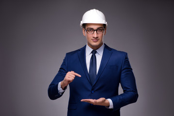 Young architect in industrial concept