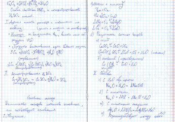 recording in Russian, in a notebook on a chemistry lesson