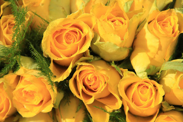 Yellow rose wedding arrangement
