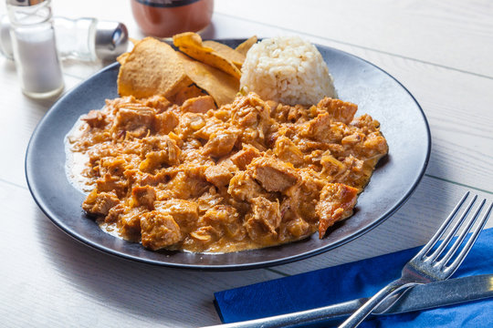 Mexican Food: Chipotle Cream Chicken Served With Rice And Nachos.