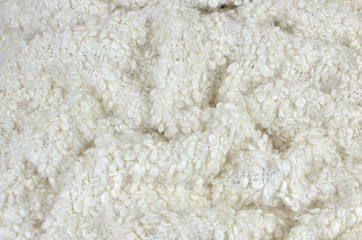Fototapeta na wymiar Texture of a soft woolen blanket with cozy look