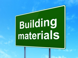 Construction concept: Building Materials on road sign background
