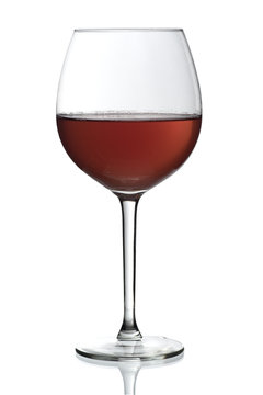 Glass of red wine on isolated white background
