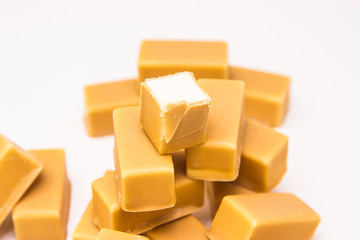 Sweet marshmallow covered with chocolate isolated on white background.