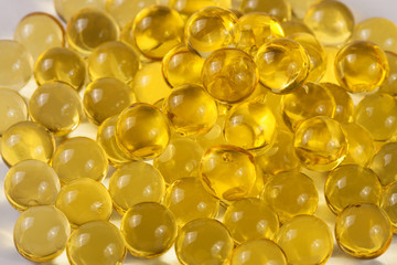 a bunch of fish oil capsules as background