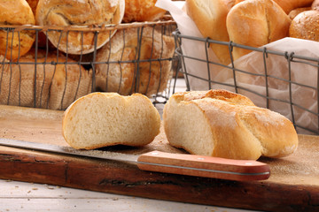 Sliced roll on a wooden board