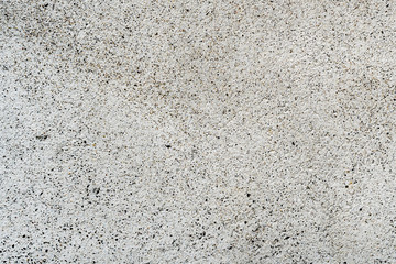 Vintage cement wall background with cracks and holes