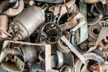 old rusty car parts and bearings