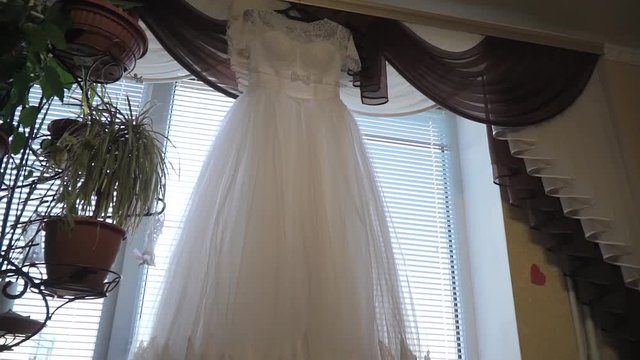 View of the wedding dress from top to bottom