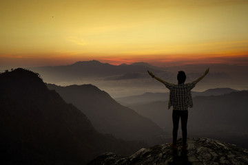 Man enjoy freedom at mountain